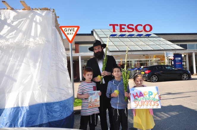 Rabbi Weinman manning the Sukkah at Tesco.JPG